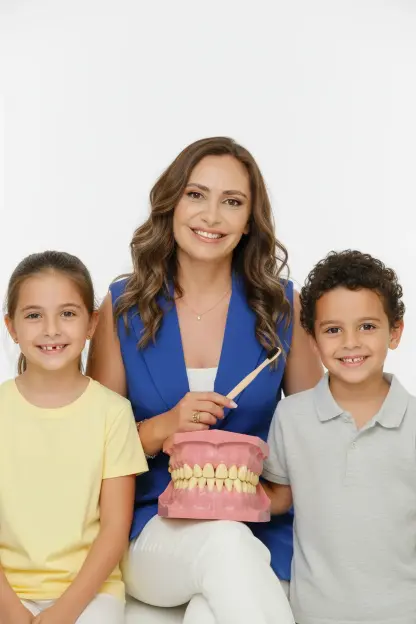 Prof. Dr. Behiye with happy children patients