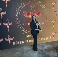 Prof. Dr. Behiye Bolgul with ferns - pediatric dentist