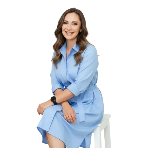 A diverse group of Turqmed doctors and medical professionals in white coats and scrubs, smiling at the camera.